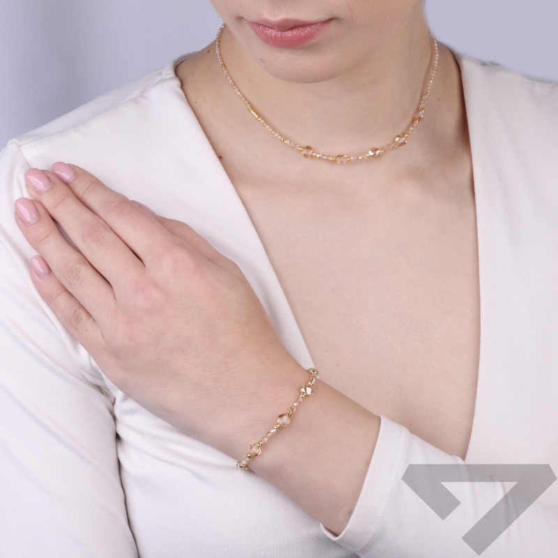 Naszyjnik z fasetowanymi topazami gold oraz kryształami Swarovski, zapięcie ze srebra 925 koloru złotego